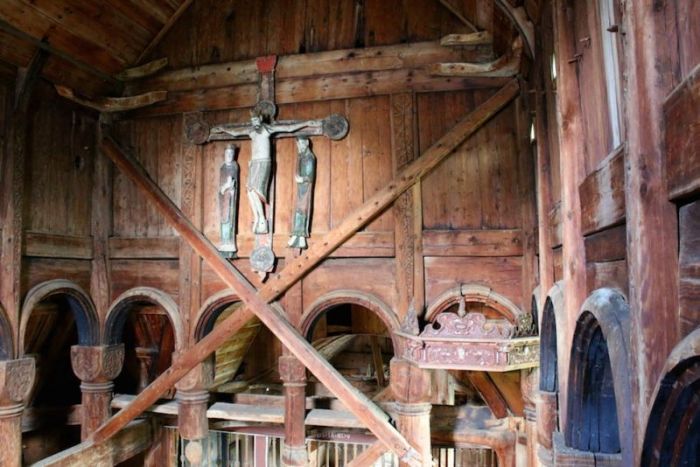 Urnes stave church. An original 12th century crucifix hangs inside the church.