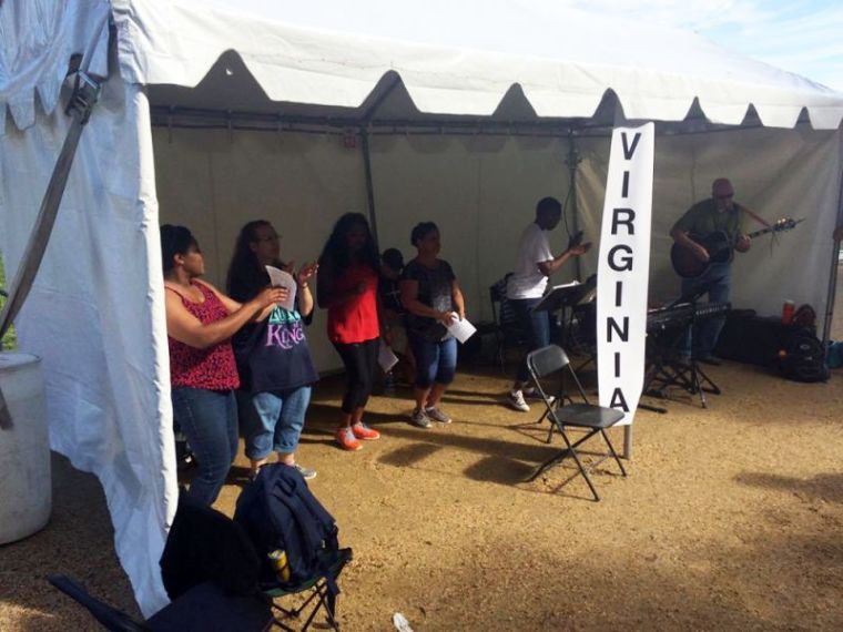 Christians sing and worship inside the Virginia tent, one of 58 tents set up at the National Mall during the America's Tent of Meeting sponsored by Awaken the Dawn, Washington, D.C. on October 7, 2017.