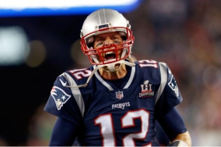 New England Patriots quarterback Tom Brady (12) takes the field before a game against the Kansas City Chiefs at Gillette Stadium, Sept. 7, 2017.