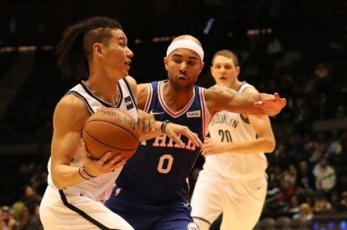 Brooklyn Nets guard Jeremy Lin (7) drives past Philadelphia 76ers guard Jerryd Bayless (0) during the third quarter at Nassau Veterans Memorial Coliseum, Uniondale, NY, USA, Oct. 11, 2017.