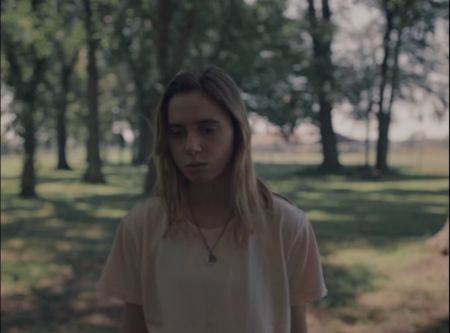 Julien Baker in 'Turn Out The Lights' music video, published on October 11, 2017.