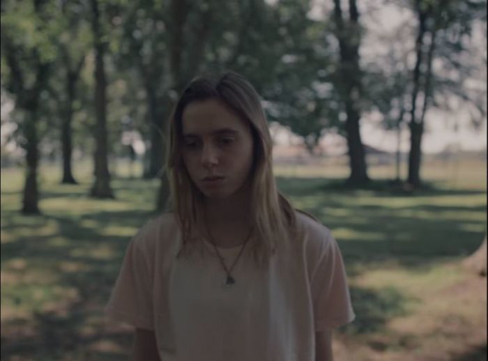 Julien Baker in 'Turn Out The Lights' music video, published on October 11, 2017.