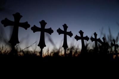 Crosses are seen near a vigil at the First Baptist Church of Sutherland Springs, Texas.