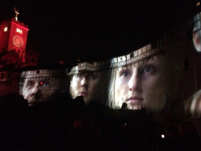 Wartburg Castle illuminated with scenes from a Luther-themed film on Nov. 1, 2017.