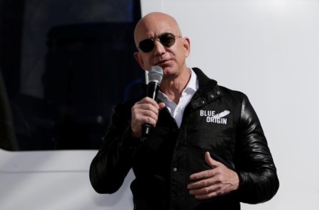 Jeff Bezos addresses the media about the New Shepard rocket booster and Crew Capsule mockup at the 33rd Space Symposium in Colorado Springs, Colorado, on April 5, 2017.