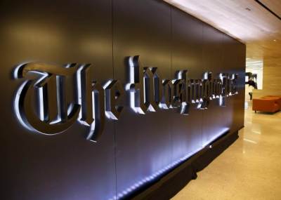 The newspaper's banner logo is seen during the grand opening of the Washington Post newsroom in Washington January 28, 2016.