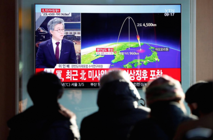 People watch a television broadcast of a news report on North Korea firing what appeared to be an intercontinental ballistic missile (ICBM) that landed close to Japan, in Seoul, South Korea, November 29, 2017.