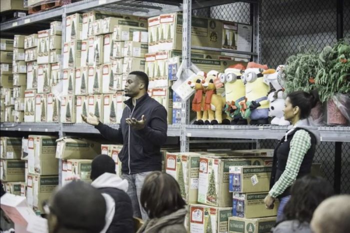 Baltimore Ravens tight end Benjamin Watson speaks during a Big BENefit event in a Baltimore-area Walmart in December 2016.