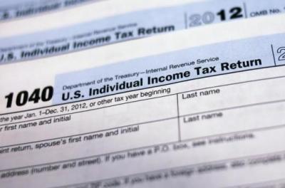 U.S. 1040 Individual Income Tax forms are seen in New York March 18, 2013.