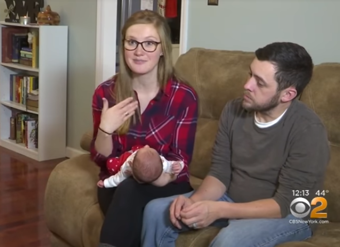 Tina Gibson, 26, and her husband Benjamin, 33, and their daughter Emma Wren.