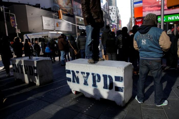 New York Police Department bollards sit on a sidewalk in Times Square to provide security against ramming attacks ahead of New Year's Eve celebrations in Manhattan, New York, December 28, 2017.