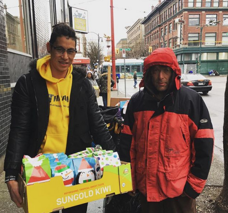 Jeremy Lin serves people on the streets of Vancouver, Canada on December 25, 2017.