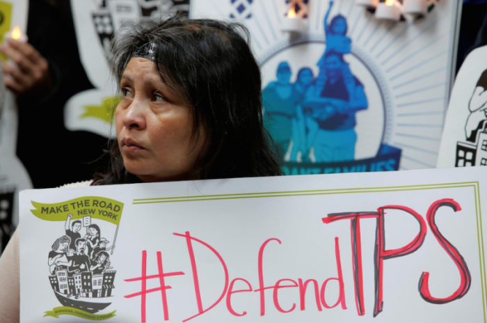 Salvadoran immigrant Mirna Portillo watches on during a media conference at the New York Immigration Coalition following U.S. President Donald Trump's announcement to end the Temporary Protection Status for Salvadoran immigrants in Manhattan, New York City, U.S., January 8, 2018.