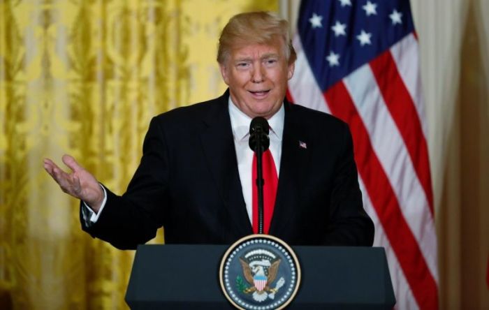 U.S. President Donald Trump addresses a joint news conference with Norwegian Prime Minister Erna Solberg in the East Room of the White House in Washington, U.S., January 10, 2018.