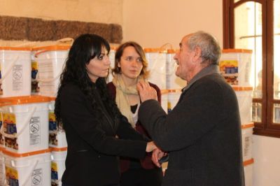 Assyrian activist Juliana Taimoorazy of the Iraqi Christian Relief Council meets with Iraqi Christian refugees in Amman, Jordan, during a trip there in January 2018. The organization distributed over 2,400 buckets of food to refugees in Jordan and Iraq.