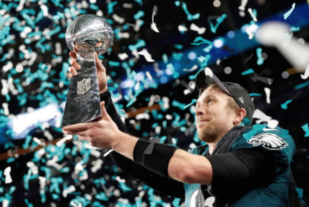 Philadelphia Eagles' Nick Foles celebrates with the Vince Lombardi Trophy after winning Super Bowl LII, February 4, 2018, at the U.S. Bank Stadium in Minneapolis, Minnesota.