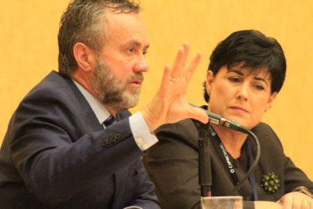 Biola University President Barry Corey speaks during a panel discussion at the Council for Christian Colleges and Universities 2018 International Forum in Grapevine, Texas. He is flanked by Deana Porterfield, the president of Roberts Wesleyan College in Rochester in New York.