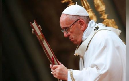 Pope Francis as he leads the Christmas night Mass in Saint Peter's Basilica in 2017.