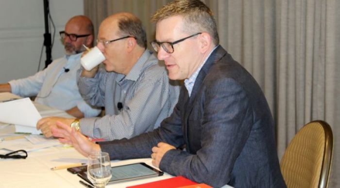 Andy Crouch (foreground), Andrew Sullivan (left), and Peter Wehner (middle) talk on 'Technology: A Threat to the Human Soul?' at Faith Angle Forum, Nov. 7, 2017, Miami Beach, Florida.