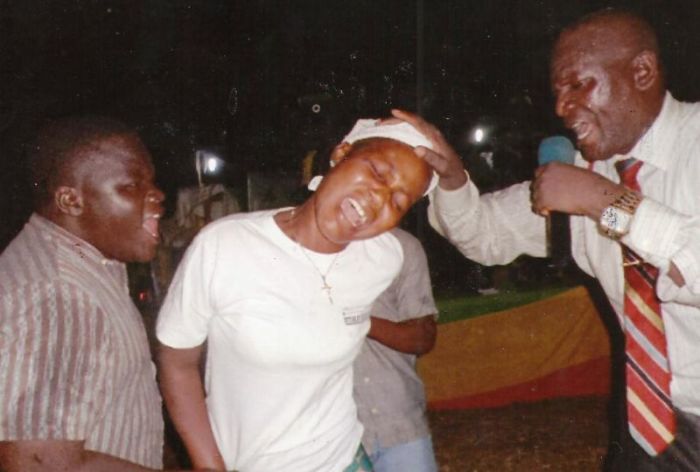 Pastor James Cuffee of Christ Evangelistic Fellowship Ministries in Liberia prays during an evangelistic crusade in this undated photo.