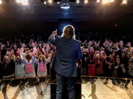 Embattled evangelist Clayton Jennings preaches at a crusade in November 2017.