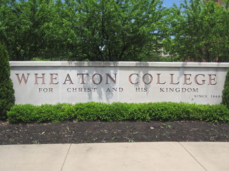 The sign on the campus of Wheaton College display's the Illinois evangelical institution's motto.