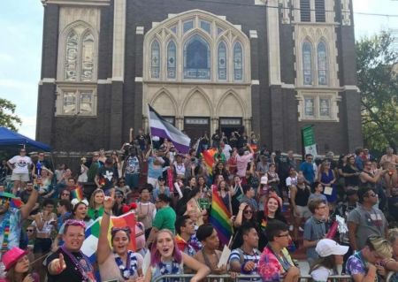 LGBT activists and allies outside of Oak Lawn United Methodist Church in Dallas, Texas. In 2014, Oak Lawn affiliated with Reconciling Ministries Network, a pro-LGBT advocacy group seeking to change the UMC's stance on homosexuality and gay marriage.