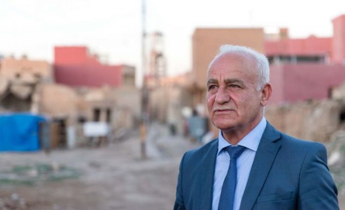 Anis surveys the destruction in the old part of Qaraqosh that ISIS left.