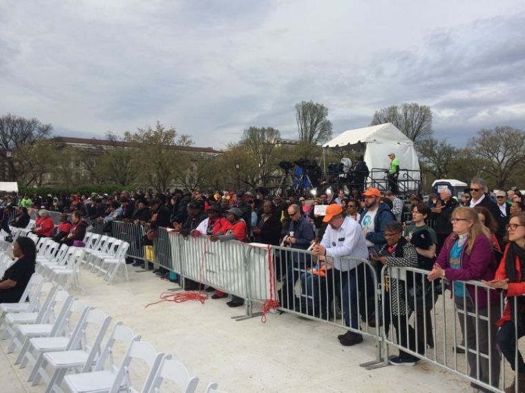 Attendees at the A.C.T. to End Racism interfaith prayer service pray on the National Mall in Washington, D.C. on April 4, 2018.