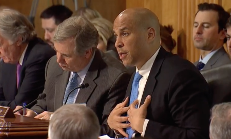 Sen. Cory Booker, D-N.J., asks CIA Director Mike Pompeo questions about his beliefs during a Senate Confirmation Hearing, April 12, 2018.