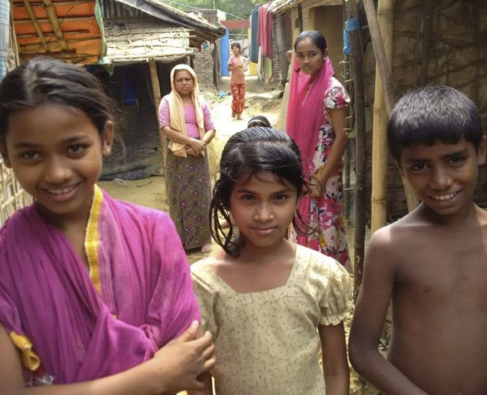 Rohingya children pose for a picture inside Balukhali Refugee Camp in Cox's Bazar, Bangladesh. March, 2018.