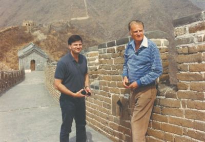 A 1988 photo of the Reverend Billy Graham (right) and his son the Reverend Franklin Graham at the Great Wall of China.