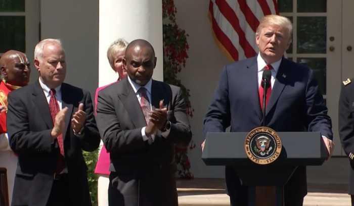 President Donald Trump announces an executive order creating the White House Office of Faith-Based and Community Initiatives at a National Day of Prayer event held at the White House Rose Garden, May 3, 2018.