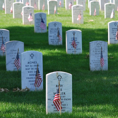 Graves are decorated with flags for at Arlington National Cemetery in Arlington, Virginia, on May 26, 2008.