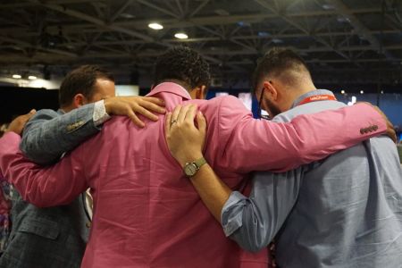 Messengers pray together at the Southern Baptist Convention's Annual Meeting at the Kay Bailey Hutchison Convention Center in Dallas, Texas, on June 13, 2018.