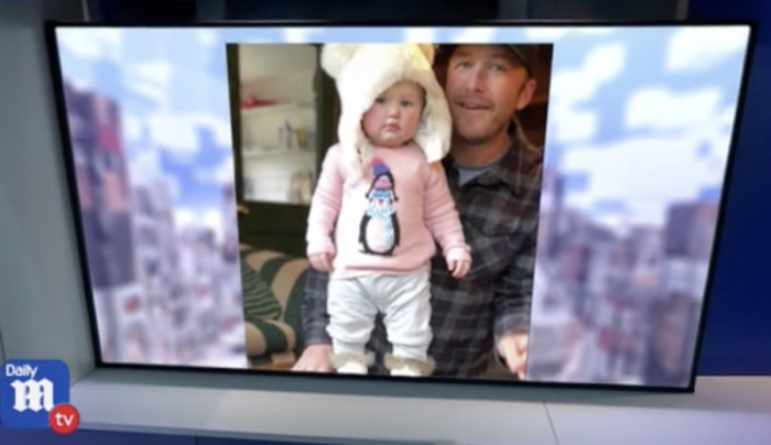 Olympian Bode Miller holding daughter Emeline Miller