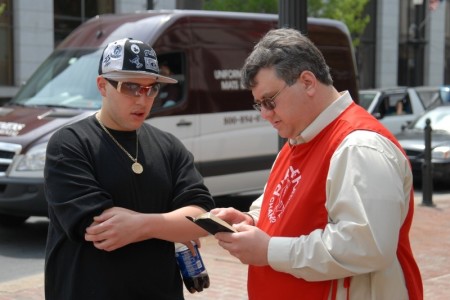 Rodney Keister (Right), a traveling Christian evangelist with Evangelism Mission, shares the Gospel.