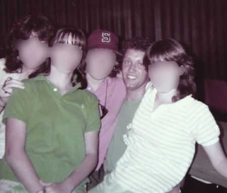 Pastor John Finley poses with youth members of Travis Avenue Baptist Church in Fort Worth, Texas, in this photograph taken during his time there in the 1980s.