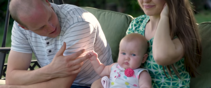 Baby Hope together with her adoptive parents Ryan and Rebecca Holets