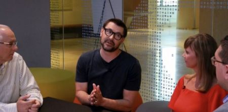 Pastor Mark Batterson (2nd from left) speaks during an interview.