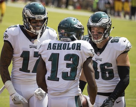 Zach Ertz (right) converses with Philadelphia Eagles teammates Nelson Agholor (center) and Alshon Jeffrey (left)