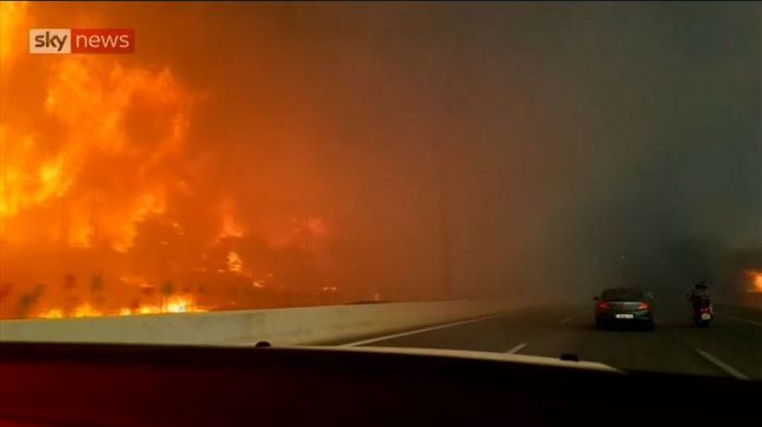 Wildfires in Greece near the village of Kineta raging in this video published on July 25, 2018.