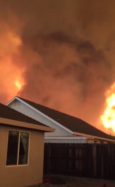 A huge 'fire-tornado' seen near Redding, California, as ultra-hot temperatures create conditions that cause updrafts that swirl, July 27, 2018.