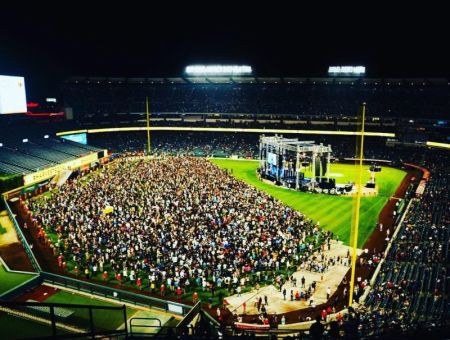 Thousands take to the field to answer the invitation to profess their faith in Christ at Greg Laurie's 2018 Southern California Harvest at Angel Stadium in Anaheim, California on Aug. 18, 2018.