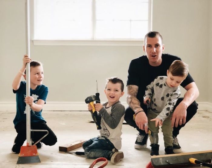 The late Pastor Andrew Stoecklein and his three sons.