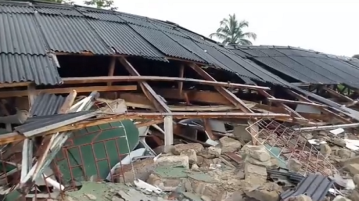 The remains of St. Paul Catholic Church in Adagbrasa, Nigeria lay after the church collapsed during Sunday service on Sept. 2, 2018.