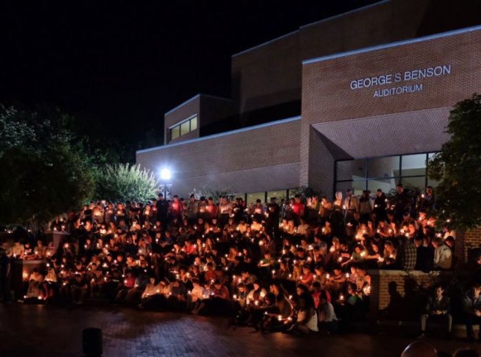 Students at Harding University in Searcy, Ark., remember graduate Botham Shem Jean on Monday September 10, 2018.