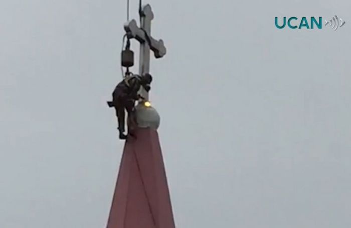 Rooftop cross demolition in China at Lingkun St. Michael Church of Yongqiang Parish on October 11, 2018.