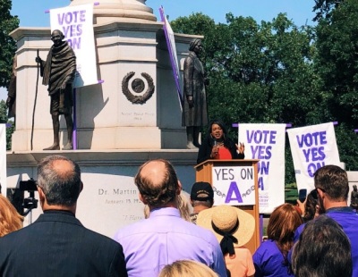 Colorado state Rep. Leslie Herod, D, speaks at a rally in favor of Amendment A on Aug. 29, 2018.