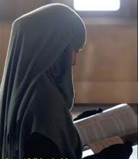 Muslim woman reading